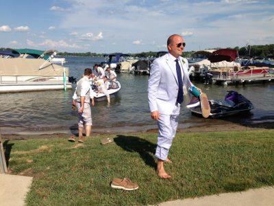In typical Clark Lake style, B.J. arrives at his wedding via a Nautique