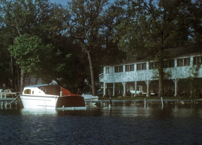 This a view of the building on Eagle Point that, on the second floor, was first a dance hall, then a roller skating rink, and later became the home of the Clark Lake Players.  It was here that South Pacific was performed in 1963.  The perspective is from the east side of Eagle Point, looking towards the southwest.